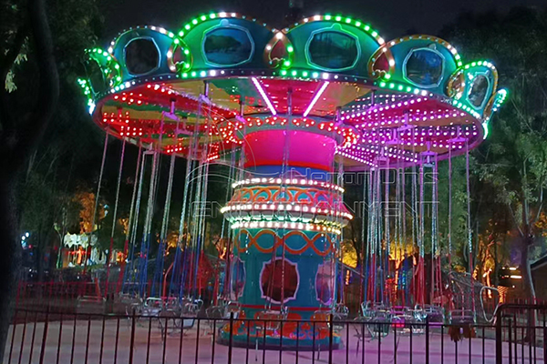 Park Chair-o-plane Amusement Attraction Equipped with LED Lights Running at Night